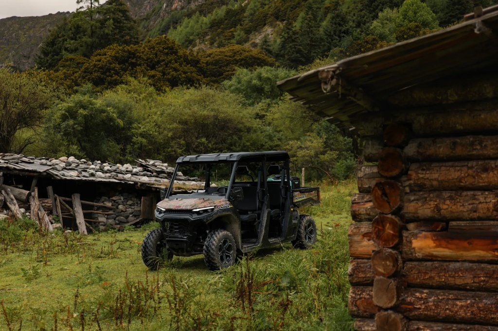 A UTV driving on a rural farm path for efficient property commuting.jpg